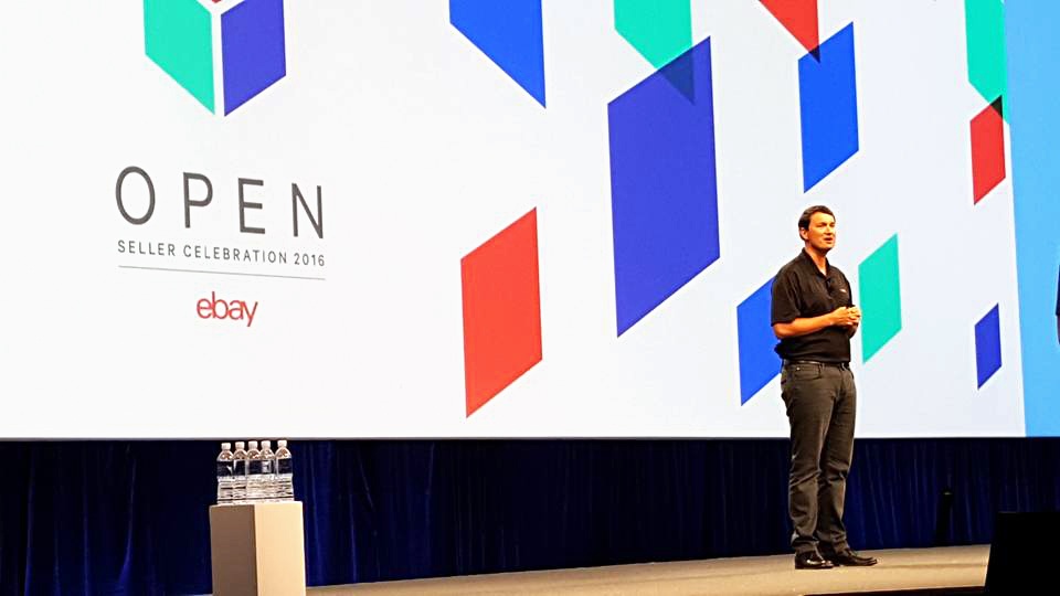  a speaker on stage at the 2016 eBay OPEN conference